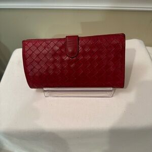 Bottega Veneta red very soft woven leather wallet. Snap front closure.